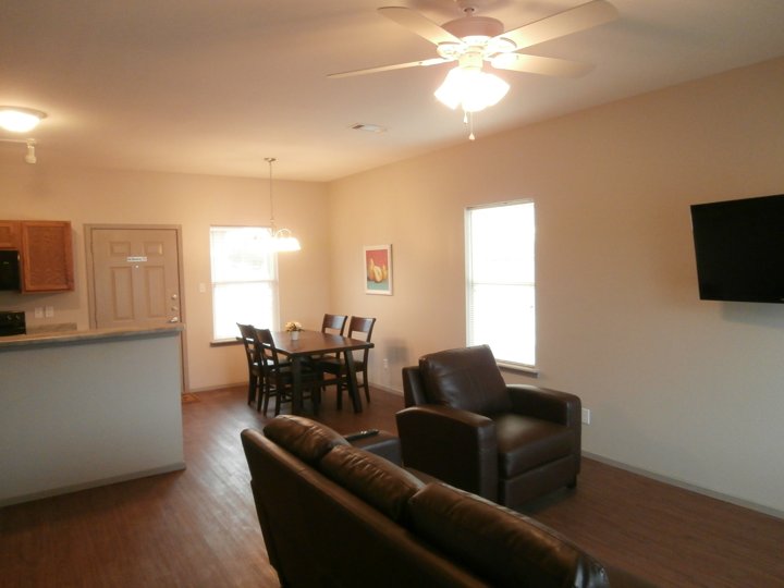 Kitchen and furnished living room